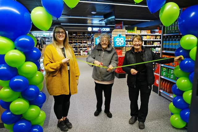 Rainworth community co-op opened by 90 year COOP member for 70 years - Jean Bartle - see with Caitlan Griffiths retail implementation team leader and Donna Hall store manager.