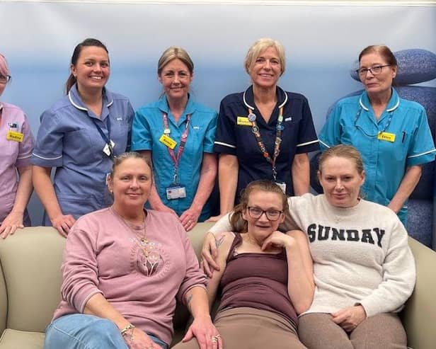 Back row l to r: Nadine Shinfield (Activities coordinator), Lauren Dixy (Staff nurse), Anne Shirley (HCA), Michelle Stendall (Lead therapist, Living Well Centre lead) and Ellen Patrick (HCA). Front row: Centre Danielle with carers Sarah and Teresa.