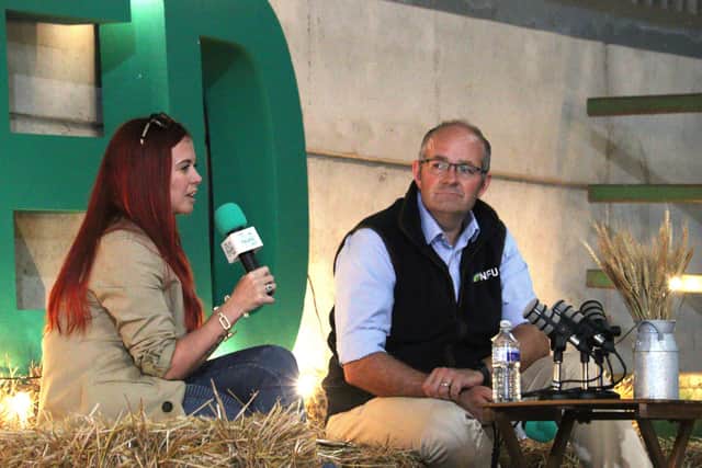 Red Shepherdess Hannah Jackson with NFU President Tom Bradshaw at the event at Woodborough Park Farm in Nottinghamshire.