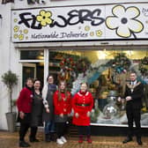 Sutton florists Flowers by Lesley show off their festive window. Photo: Submitted