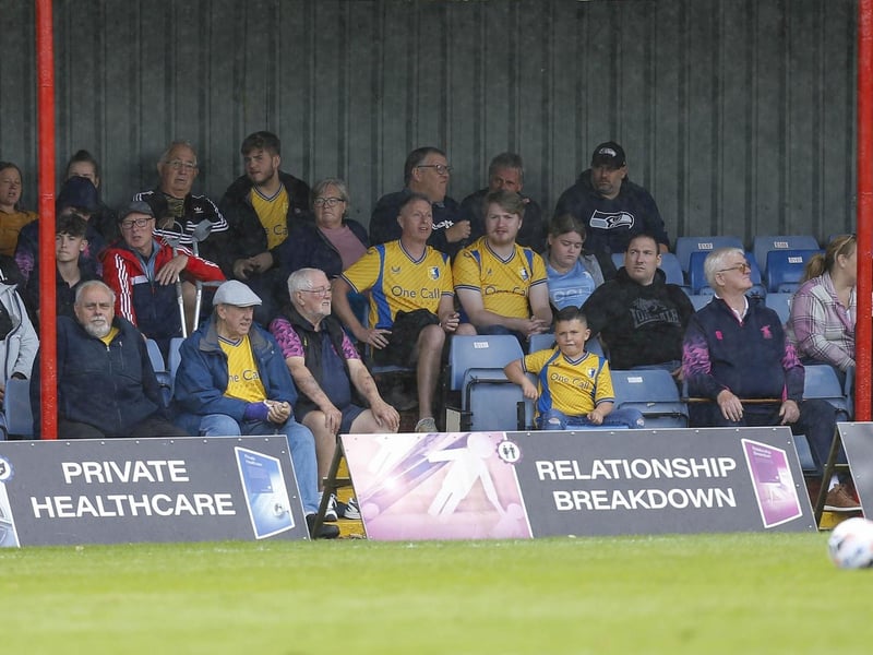 Mansfield Town fans watch a convincing 4-0 win at Alfreton Town.