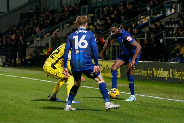 Lucas Akins in possession during the Bristol Street Motors Trophy against Burton Albion FC at the Pirelli Stadium : 21 Nov 2023 : Photo Jeanette & Adam HOLLOWAY @ The Bigger Picture.media
