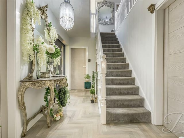 Time to check out the first floor now, so let's pass through the welcoming entrance hallway, which has a touch of elegance about it, and climb the carpeted staircase.