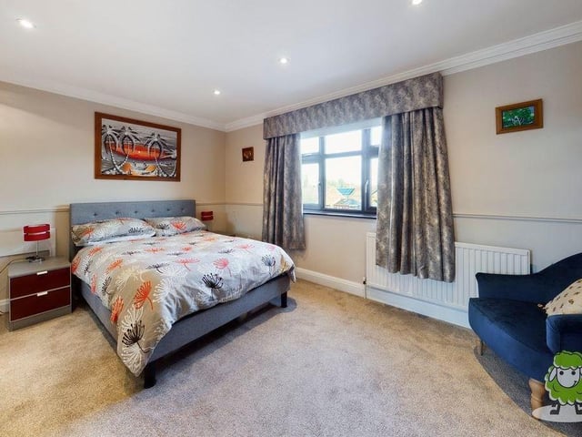 The second of the four bedrooms is also a good-sized double, facing the front of the £525,000 house. An added bonus in this room is a set of fitted wardrobes.