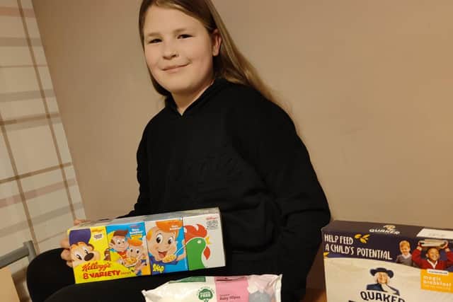 The 11-year-old began collection donations after the sight of homeless people brought her to tears.