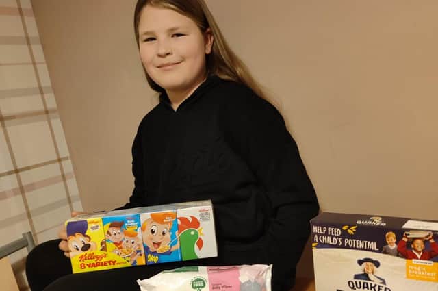 The 11-year-old began collection donations after the sight of homeless people brought her to tears.