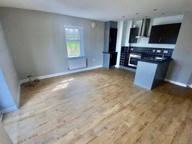As you can see, although the open-plan area fits in a contemporary kitchen, there is still plenty of space to accommodate a sitting room. Put your own stamp on the place!