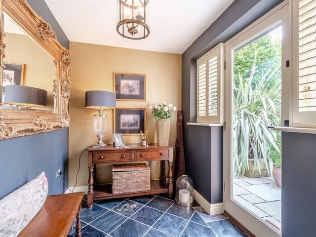By a second front entrance to the Ravenshead property is this boot room, which is full of character. The tiled floor benefits from underfloor heating.