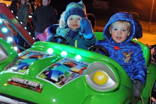 Toddlers Freddie Orr and Austin Greasley, both aged two, pictured on a car ride at the 2016 Debdale Lane Sports Ground firework event