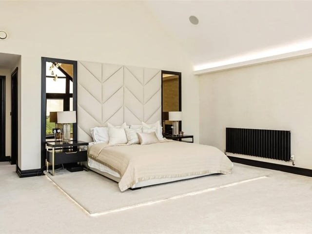 The stunning spacious master is the perfect retreat to unwind after a busy day.
