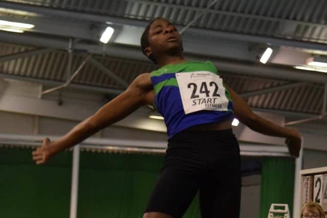 Jumping to glory - Mansfield Harriers' Brandon Lee.