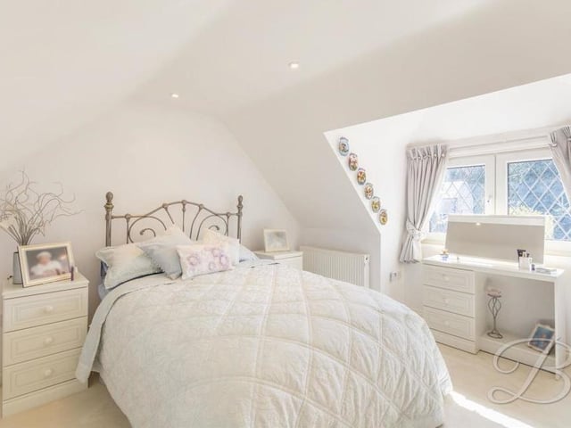 Like all the bedrooms in the house, the sixth and final one on the first floor is beautifully presented. The floor is carpeted and the double-glazed window faces the side of the property.