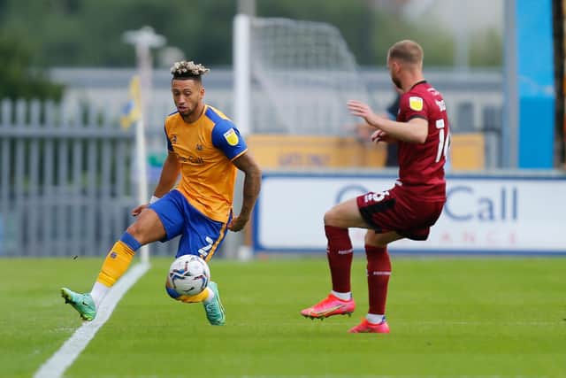 Mansfield Town defender Kellan Gordon pushes forward. Pic: Chris Holloway / The Bigger Picture.media