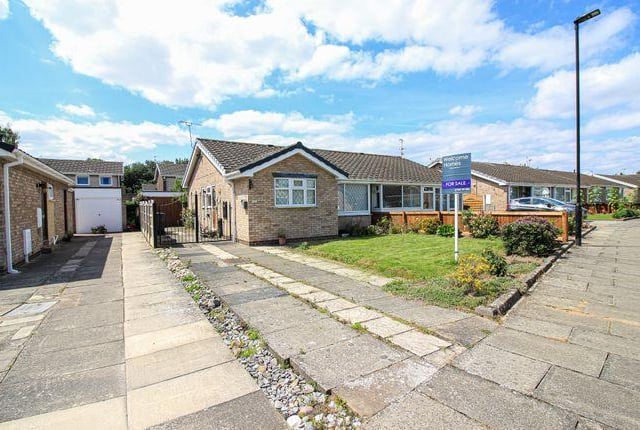 This two bedroom bungalow has a cozy conservatory.
