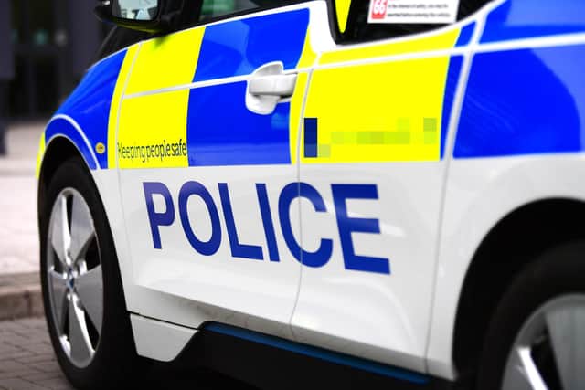 Police are investigating the theft of a purse in Mansfield town centre.