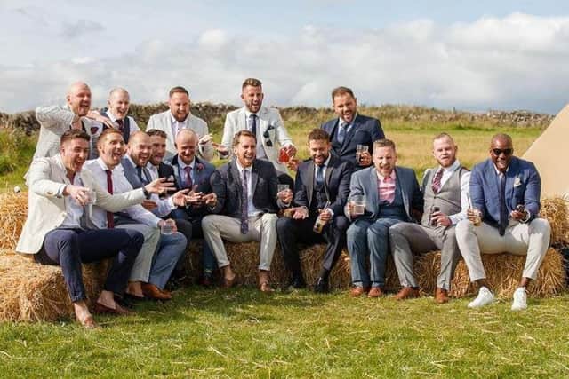 The group, pictured here at Stephen Kerry's wedding, will be taking on the challenge for Facial Palsy UK this summer