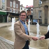 Jenna Simpson receives the keys to her new salon from Andy Abrahams, Mansfield mayor, outside the Old Town Hall.