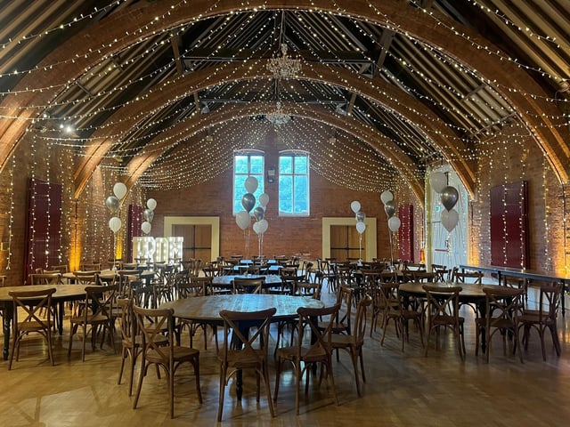 The venue was decked out to the nines with fairy lights and balloons.