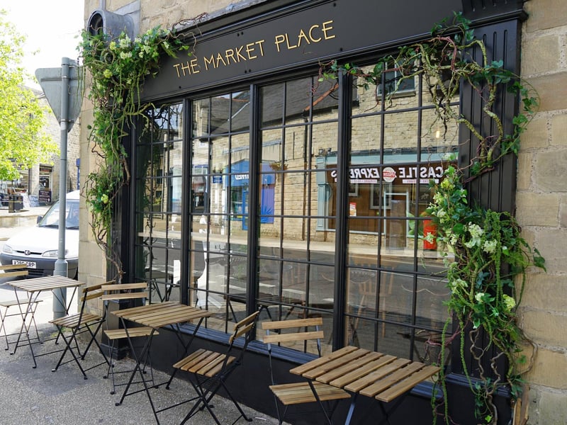 Customers can watch the world go by from the outdoor tables and chairs in front of the premises.