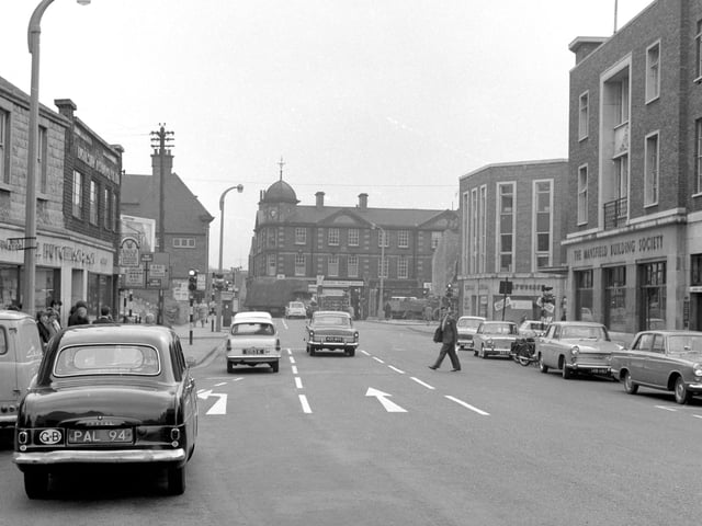 Clumber Street was a hive of activity with many shops on both sides of the road.