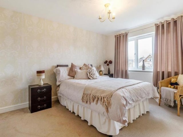 The second double bedroom at the Mansfield house also has plenty of size and space about it. The window overlooks the back garden.