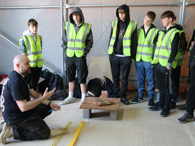 Construction teachers shared their skills and knowledge of the building sector