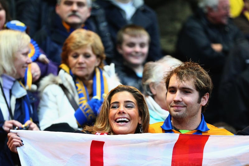 Carolyn Radford poses for a picture with a fan ahead of Stags v Liverpool.
