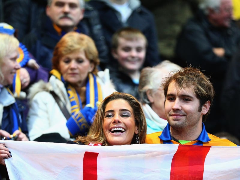 Carolyn Radford poses for a picture with a fan ahead of Stags v Liverpool.