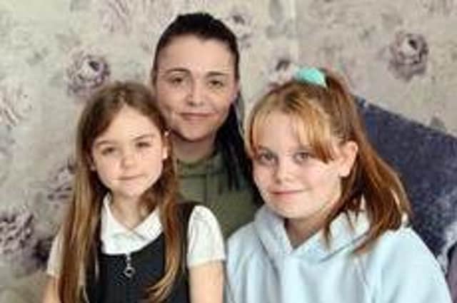 Sutton mum Claire Hannah with her two daughters. She says Double Impact saved her life.