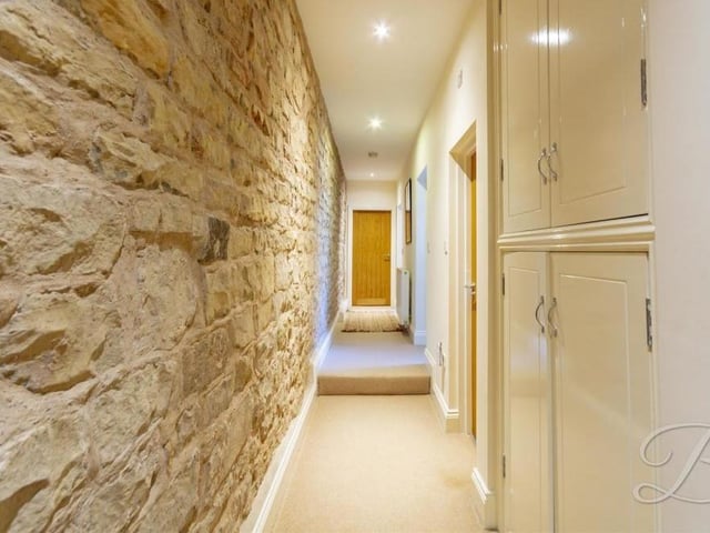Park of the long and narrow hall that stretches down one side of the Sookholme property.