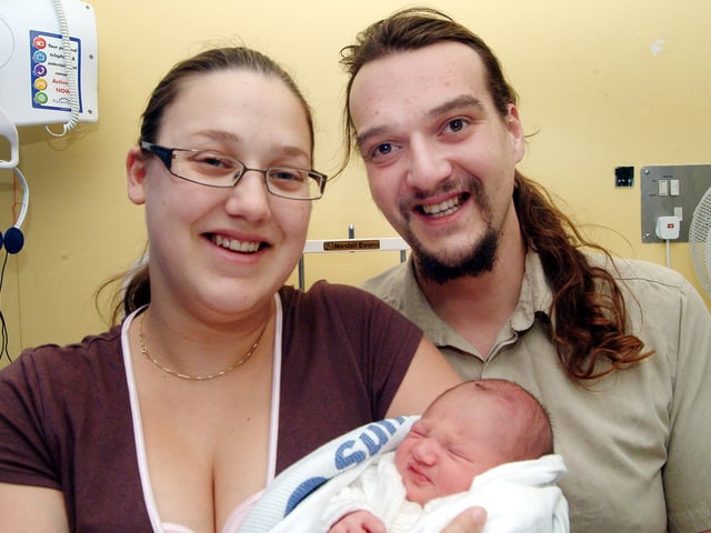 Baby George William Grinski-Colley with parents Lianne Grinski-Colley and David Colley. George William was born at 3.33pm on Christmas Day 2007 at King's Mill Hospital weighing 7lb 2ozs.