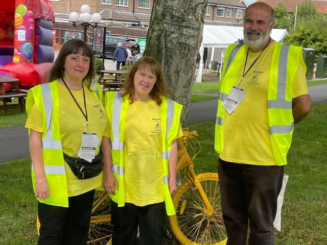 Volunteers prepare to help the event go smoothly.