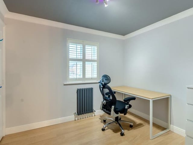 The fourth and final bedroom on the first floor could be used as a study or office. But it has space for a fitted wardrobe with hanging rail and shelving.