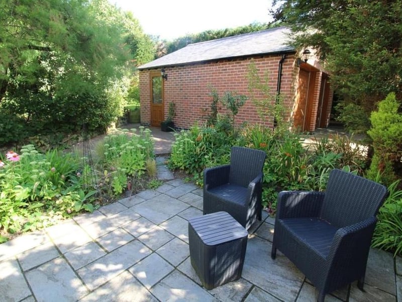 Several pleasant patio areas within the garden allow you to enjoy the sun at different times of the day.