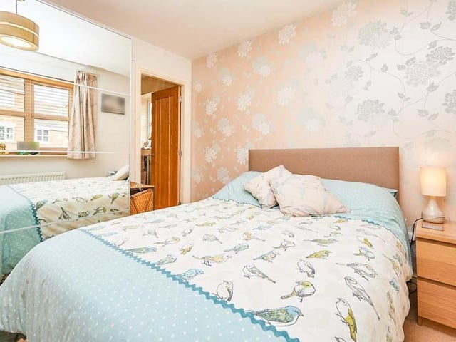Moving upstairs now to take a look at the bedrooms, beginning with this one. It is a good-sized double, with a uPVC double-glazed window facing the front of the property. It boasts its own en suite facilities.