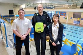 Mark Welch, Carl Smith and Carolyn Hallam pictured with the defibrillator at Water Meadows
