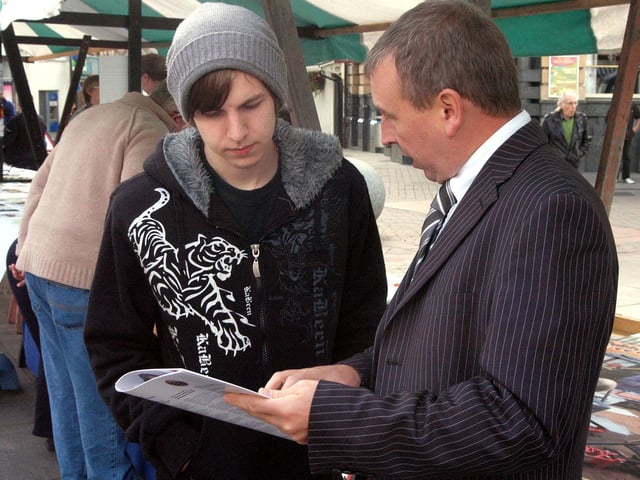 Scott Dann, left, chats with Nigel Stephens, Centre Manager of the Buildings Trades Skills Centre, about a career in plumbing, during a jobs fair organised by the Chad on Mansfield Market Place back in 2010.