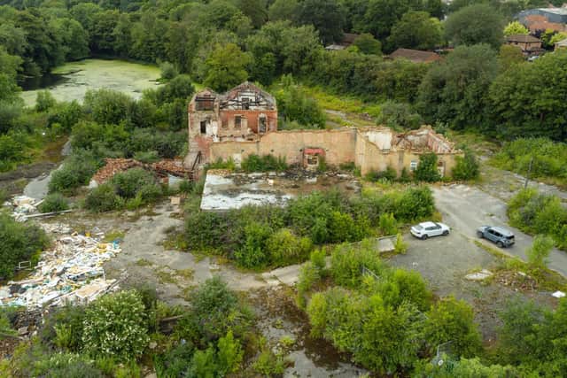 The Hermitage Mill building is a burnt-out shell after the 2022 fire.