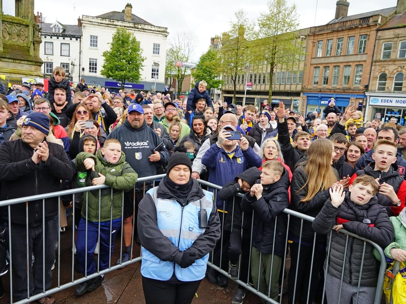 Crowds packed into Mansfield town centre this afternoon to salute their heroes.