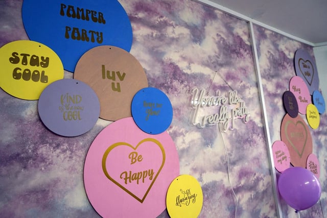 Positive affirmations are scattered around the new salon to inspire children.