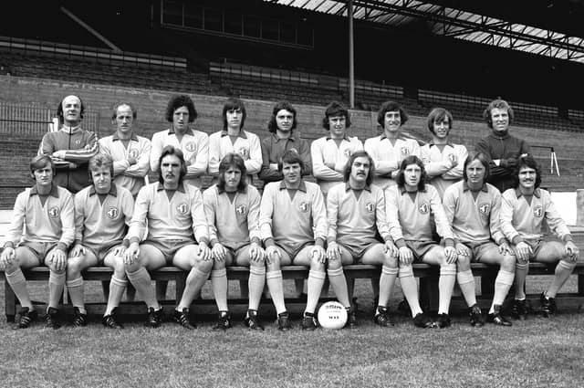 The Mansfield Town title winning squad of 1974-75. Left to right. Back row; D. Smith, manager, C. Walker, M. Hailwood, T. Cook R. Arnold, A. Shore, C. Foster, B. Foster and J. Haselden coach. Front row; P. Matthews, J. McCaffery, T. Eccles, K. Bird, S. Pate, G. Hodgson, M. Laverick, D. O'Connor and J. Lathan