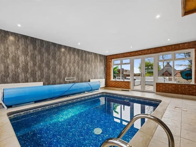 The stunning property boasts a pool with tiled flooring and Mermaid panelling to the walls and UPVC French doors leading to the external entertaining area.