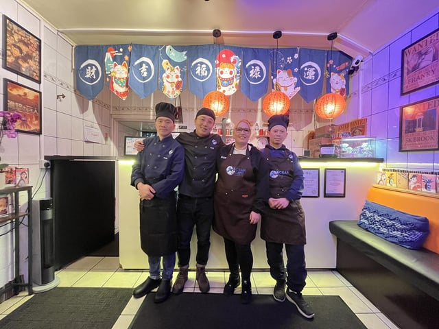 Staff celebrate their newly opened takeaway, hoping to reach more customers in the Mansfield and Ashfield community.