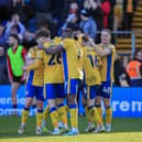 Goal celebrations as Mansfield Town hit five against Salford City on Saturday. Photo by Chris & Jeanette Holloway/The Bigger Picture.media.