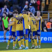 Goal celebrations as Mansfield Town hit five against Salford City on Saturday. Photo by Chris & Jeanette Holloway/The Bigger Picture.media.