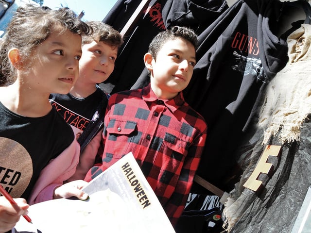 Roman, Adam and Victoria Conka join forces to find clues on the Halloween Trail in Mansfield Market