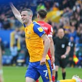 Mansfield Town midfielder Jamie Murphy celebrates his first half goal. Photo by: Chris Holloway/The Bigger Picture.media