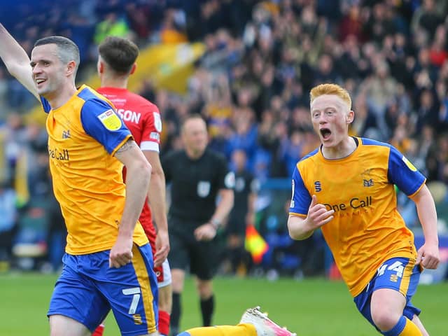 Mansfield Town midfielder Jamie Murphy celebrates his first half goal. Photo by: Chris Holloway/The Bigger Picture.media