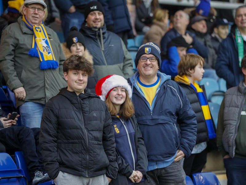 Mansfield Town fans watch the brilliant win at Peterborough United.