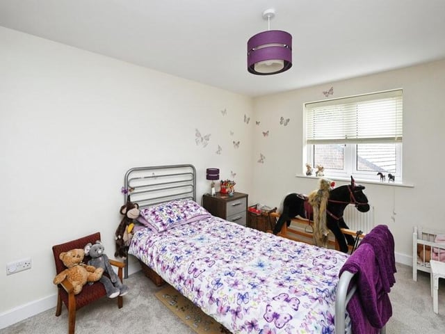 The second bedroom we look at is currently set up for a child. Giddy up!